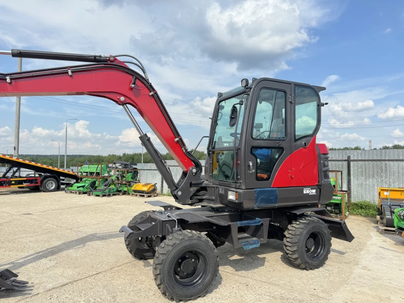 Мини-экскаватор QUADTRAC E60W (6 т, кабина, А/С, квикаплер, поворотная стрела, траншейный ковш) HV Market